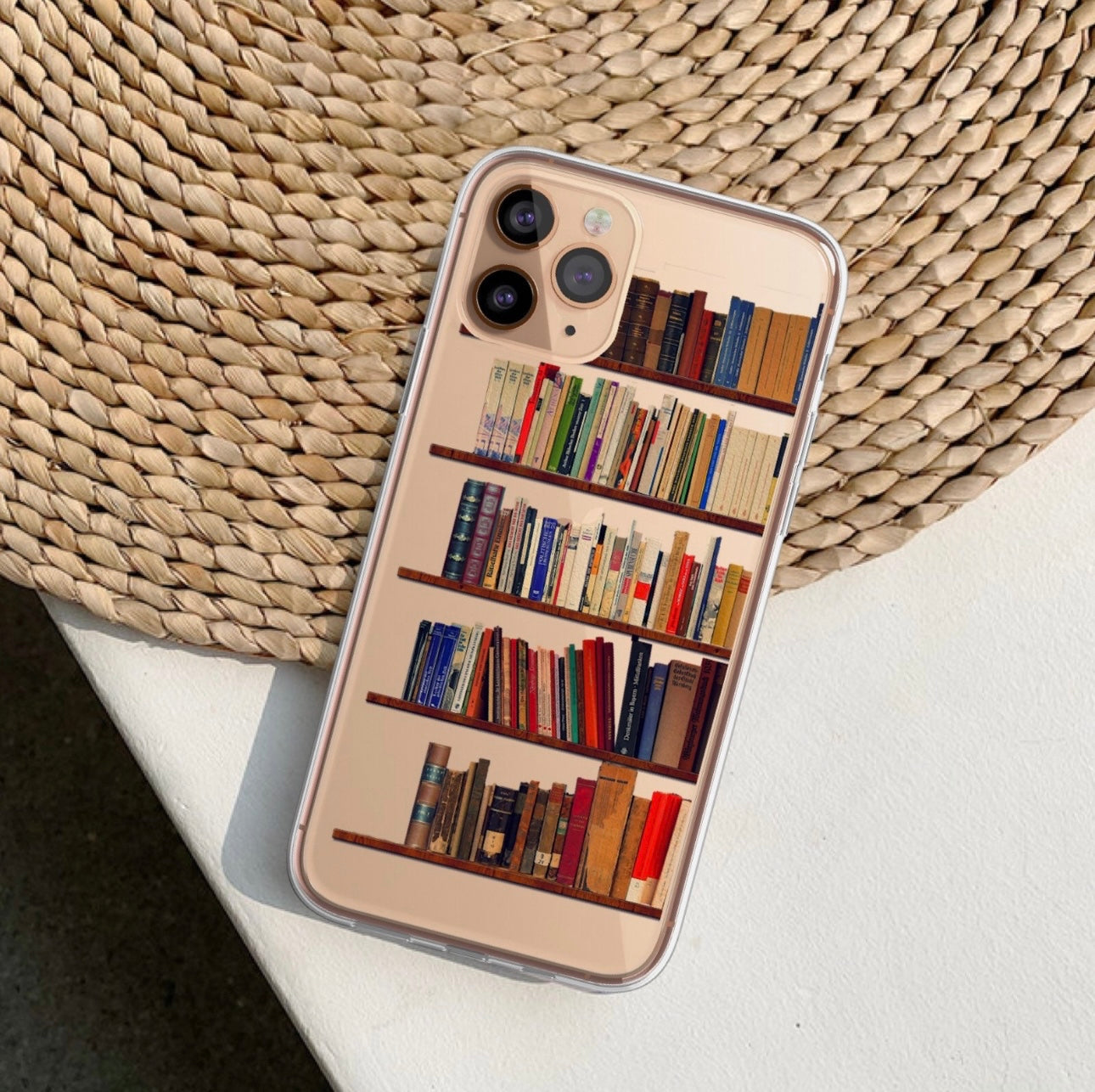 "Customize your bookshelf-themed phone case for iPhone 15, 14, 13 Pro Max, 12 Mini, 11, 7, 8, XR, as well as Samsung Galaxy S23 and S22. Our clear cases offer a unique design to showcase your style."